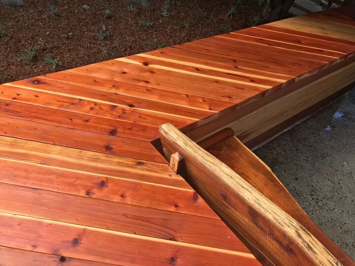 Freshly oiled redwood bench top with the frame timbers beside it
